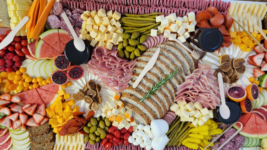Colorful platter of assorted meats, cheeses, and vegetables