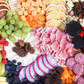 Extra-large grazing charcuterie board designed for weddings and corporate events